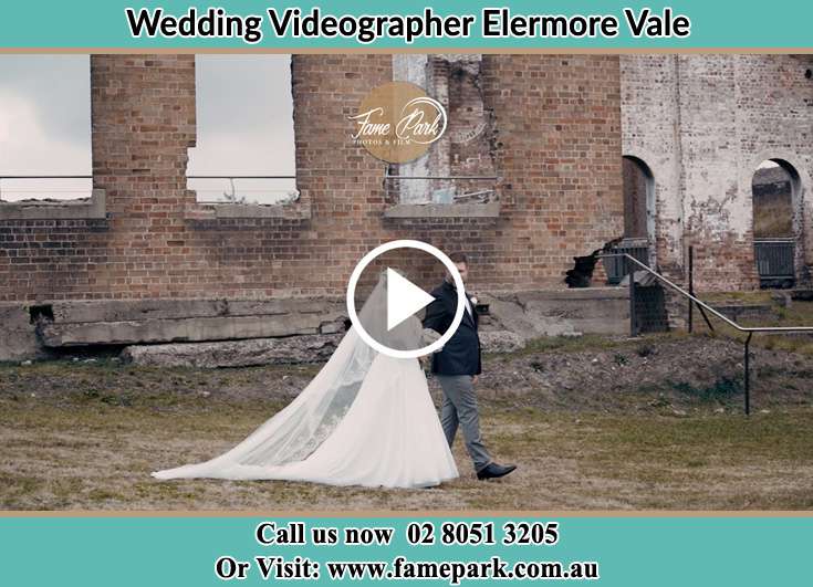 The newly weds walking at the yard Elermore Vale NSW 2287